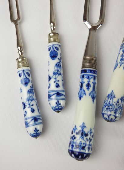 Set in metal and blue white porcelain composed...