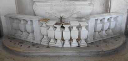 Pair of stuccoed and painted wood balustrades....
