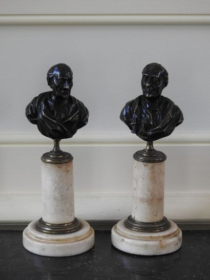 Pair of busts in bronze with brown patina...