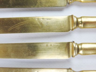 Suite of twelve gilt metal entremet knives....