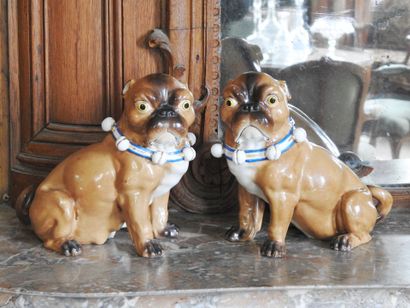 Couple of pugs in polychrome enamelled porcelain....