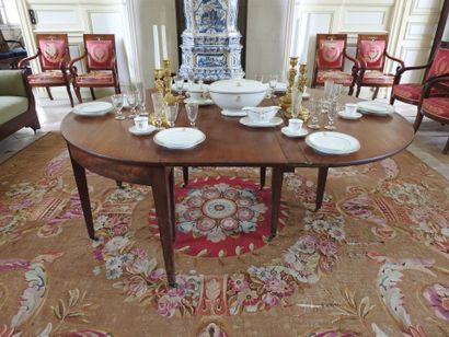 Mahogany dining room table with band, resting...