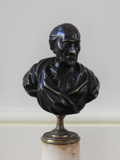 Pair of busts in bronze with brown patina...
