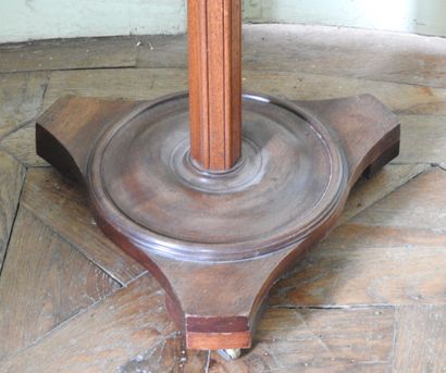 Mahogany pedestal table, resting on a tripod...