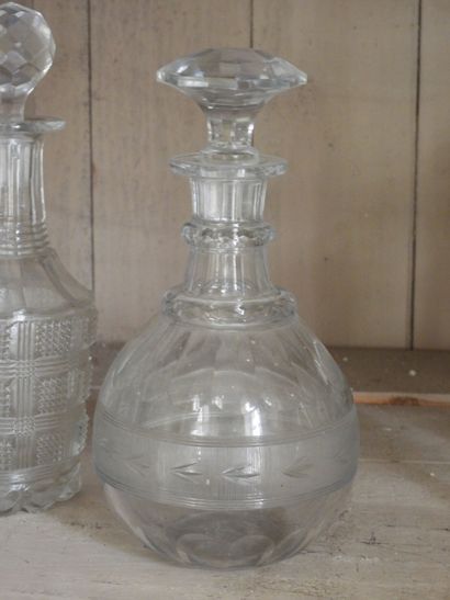 Pair of crystal decanters with diamond decorations....