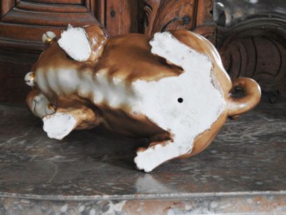 Couple of pugs in polychrome enamelled porcelain....