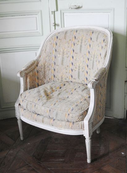 Louis XVI style molded and carved wood armchair...