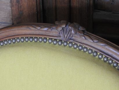 Pair of armchairs in natural wood molded...