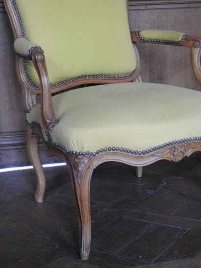 Pair of armchairs in natural wood molded...