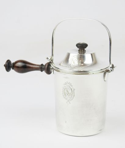 Silver handle milk jug decorated with medallions...