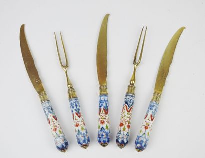 Set of three knives and two forks with two...