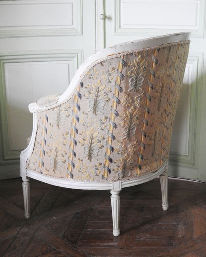 Louis XVI style molded and carved wood armchair...