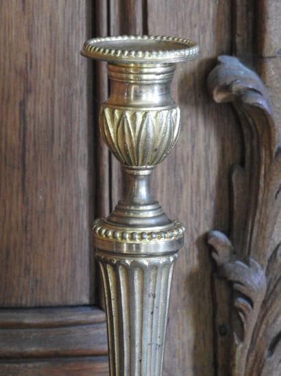 Pair of ormolu torches decorated with hearts...