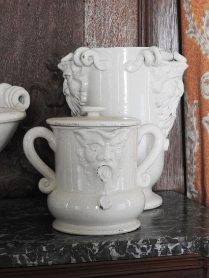 Set of cream colored cracked earthenware...