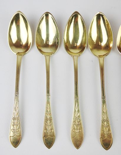 Suite of twelve small silver spoons gilded...