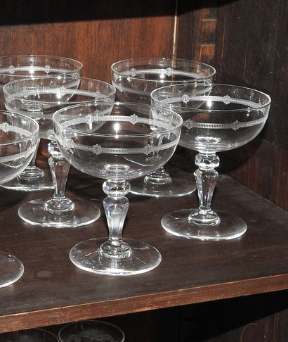 Suite of eleven Champagne glasses in crystal...