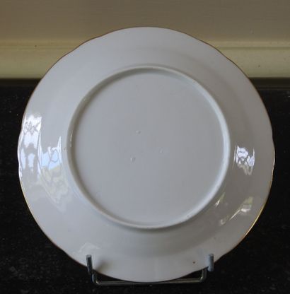 Suite of eighteen porcelain plates enamelled...