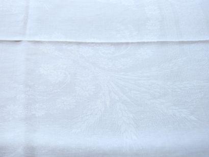 Seven damask napkins decorated with ears...