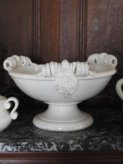 Set of cream colored cracked earthenware...