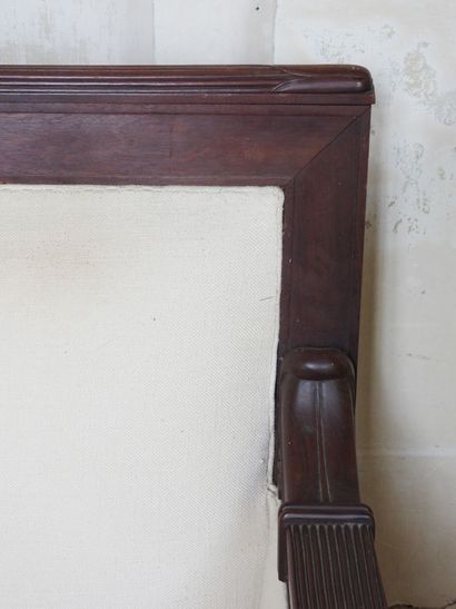Large mahogany sofa, the ribbed armrests...