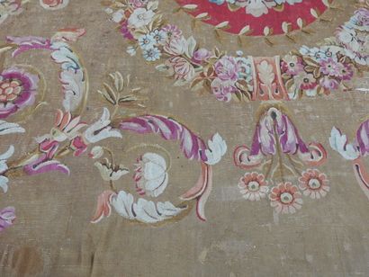 Large Aubusson carpet, the brown field decorated...