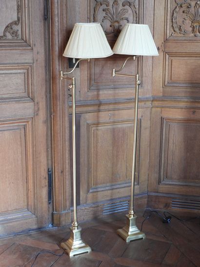 Pair of reading lamps in gilded metal on...