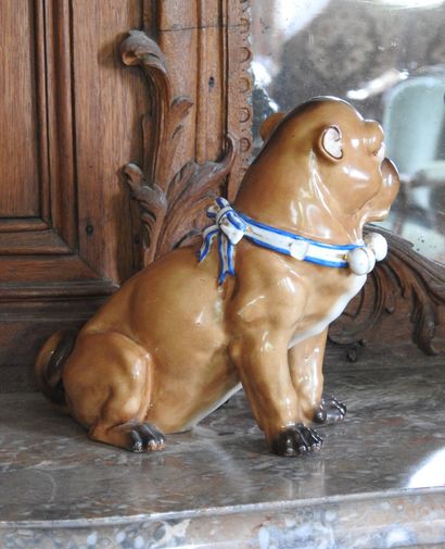 Couple of pugs in polychrome enamelled porcelain....