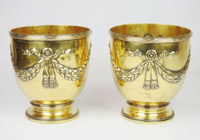 Pair of gilt Minerva silver coolers resting...