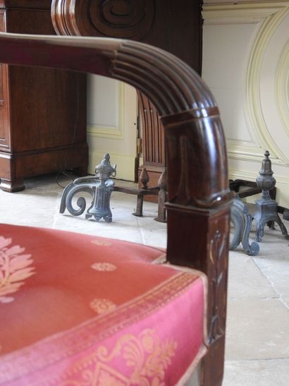 Suite of six mahogany armchairs, the armrests...