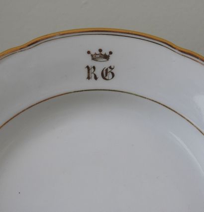 Suite of eighteen porcelain plates enamelled...