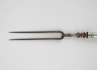 Two pronged steel fork and silver dagger...