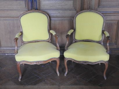 Pair of armchairs in natural wood molded...