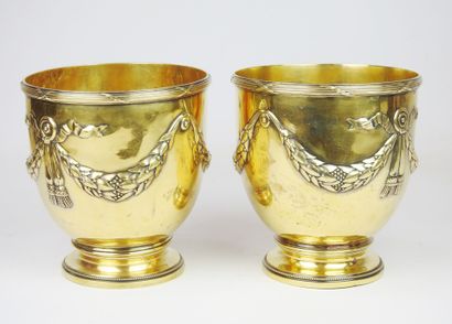 Pair of gilt Minerva silver coolers resting...