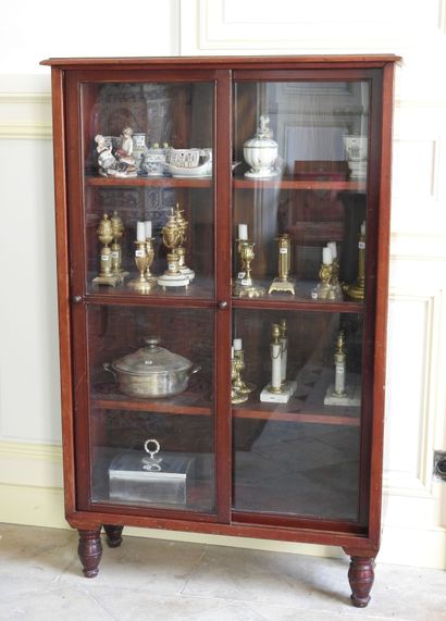 Mahogany showcase with two sliding glass...