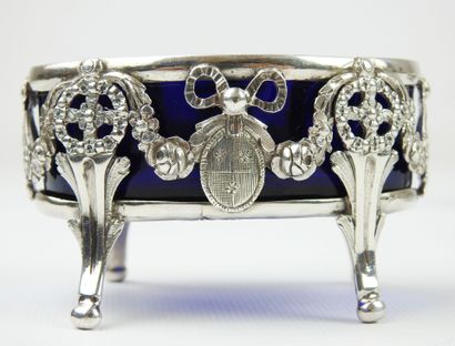 Suite of four silver salerons of oval form...