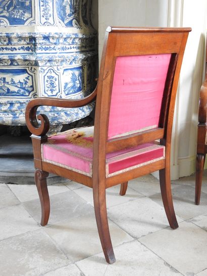 Suite of four mahogany armchairs, the armrests...