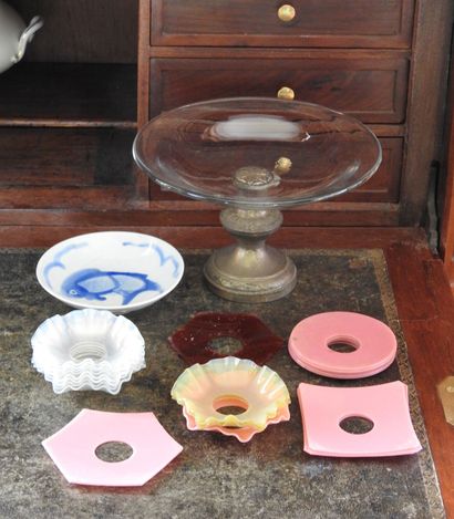 Meeting of a glass cup with metal foot and...
