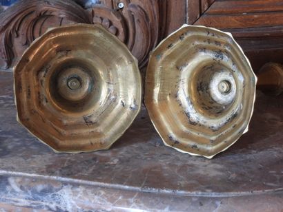 Pair of bronze torches with cut sides. Period...