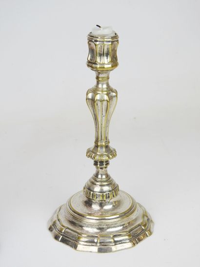 Lot including a silvered bronze candlestick...