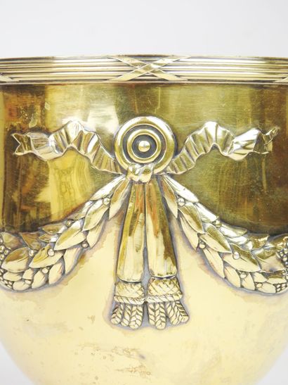 Pair of gilt Minerva silver coolers resting...