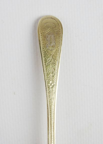 Suite of eight small gilt silver spoons,...
