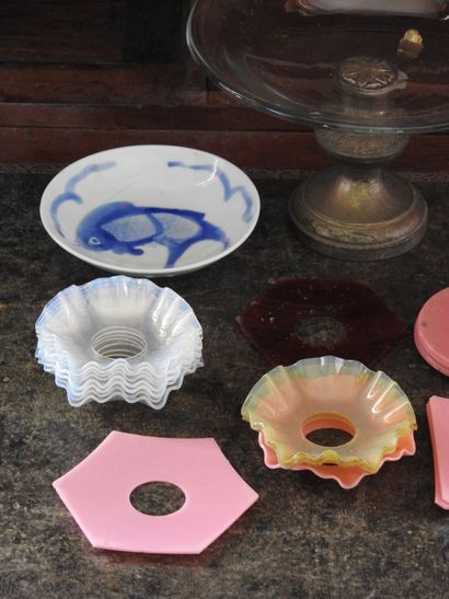 Meeting of a glass cup with metal foot and...
