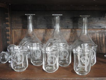 Part of service of crystal glasses monogrammed...