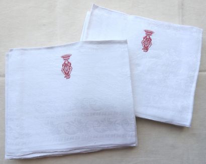 Twelve napkins decorated with flowers and...