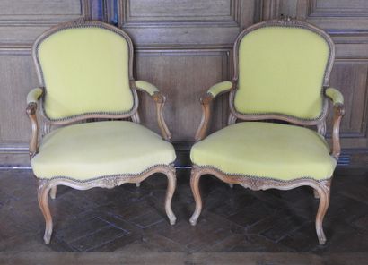 Pair of armchairs in natural wood molded...