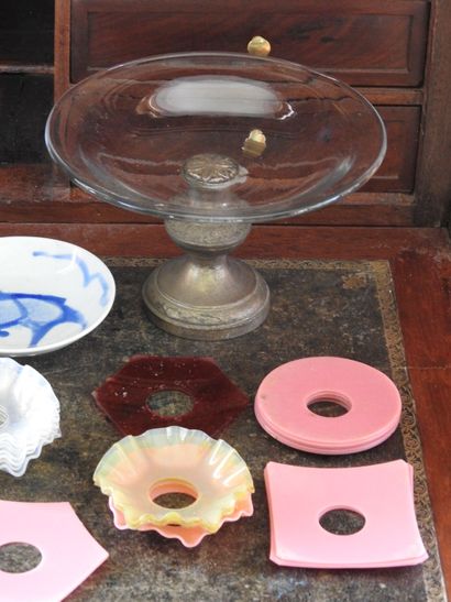 Meeting of a glass cup with metal foot and...
