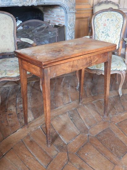 Mahogany and mahogany veneer game table resting...