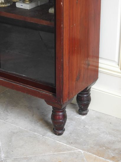 Mahogany showcase with two sliding glass...