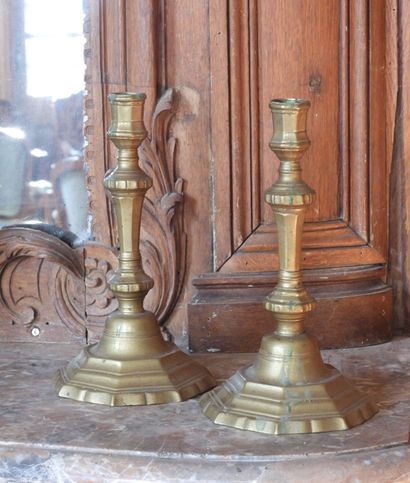 Pair of bronze torches with cut sides. Period...