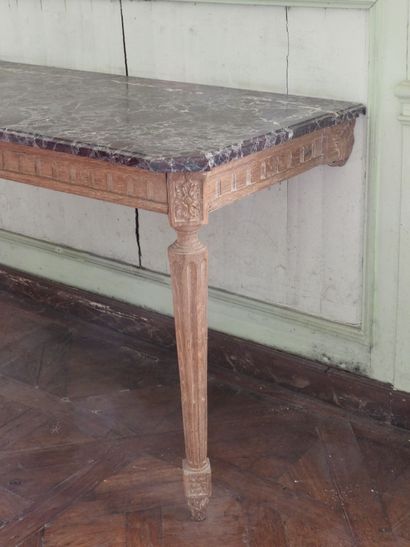 Wall console in carved natural wood resting...